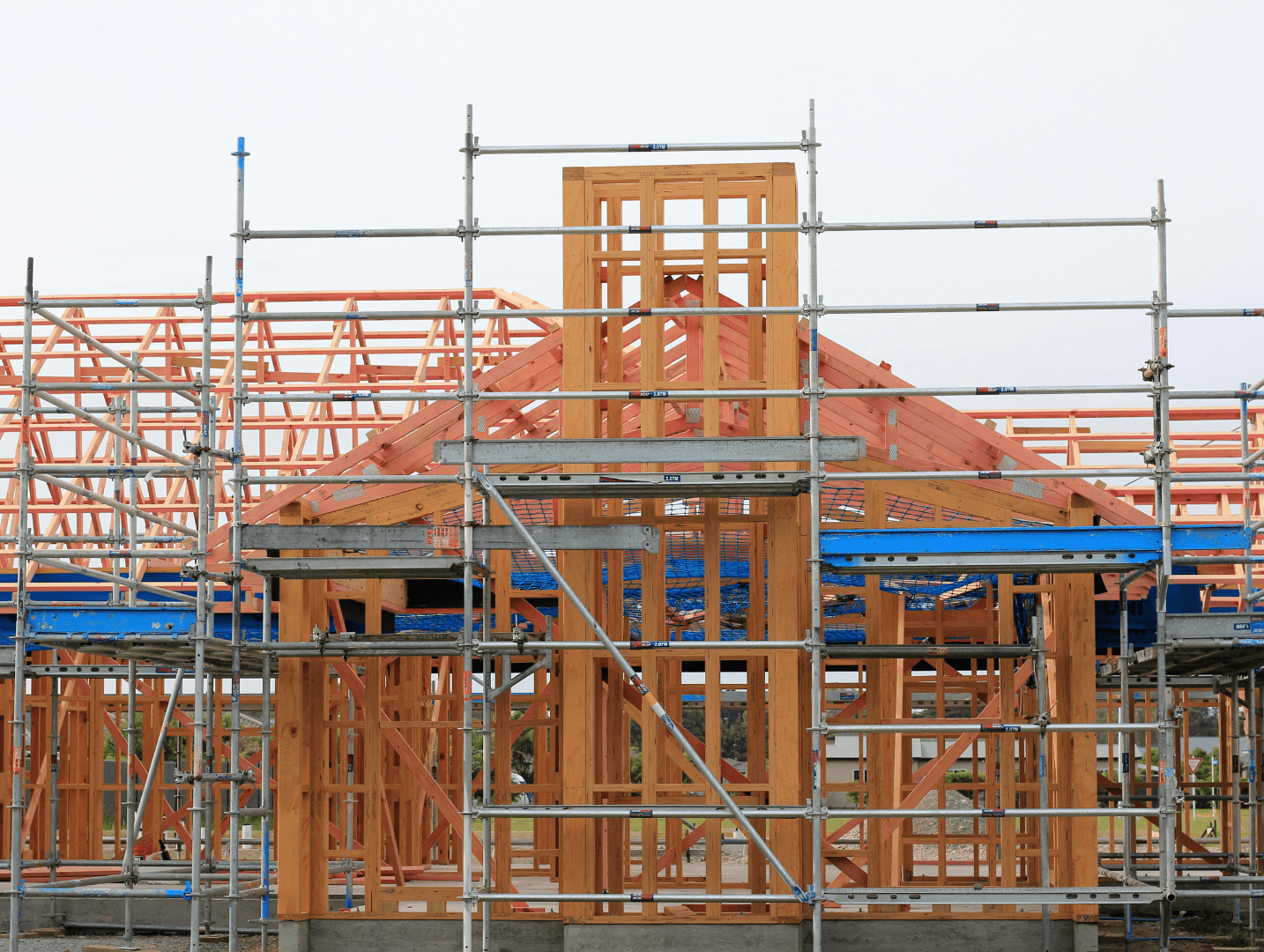 A building under construction with scaffolding around it.